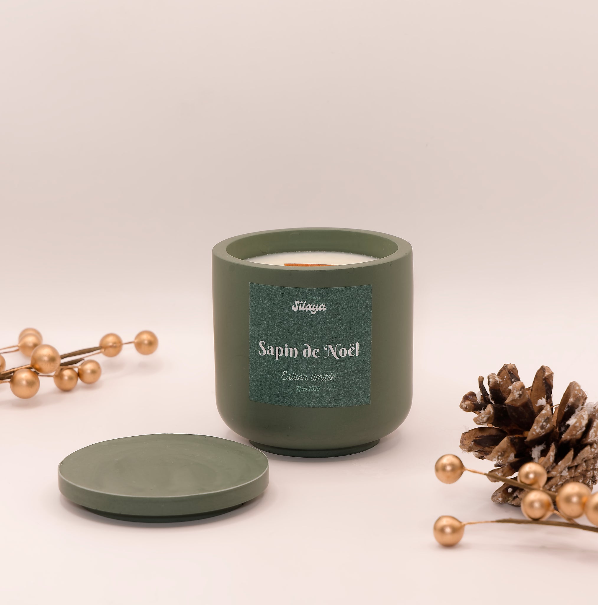 Bougie parfumée dans un pot en jesmonite vert foncé